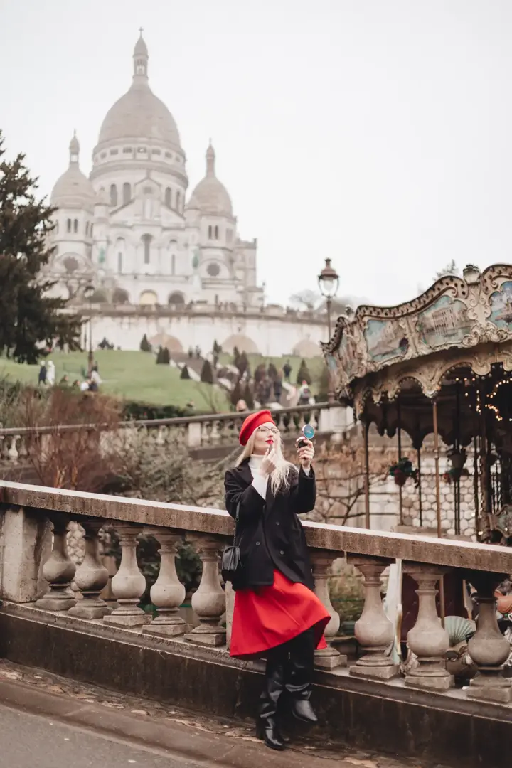 Woman red beret Sacre Coeur carousel Paris